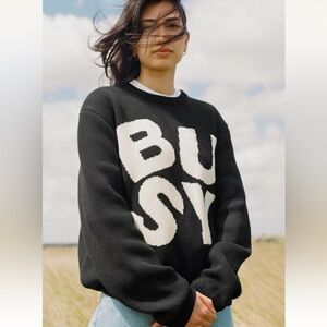 Black Sweater with Bold Lettering